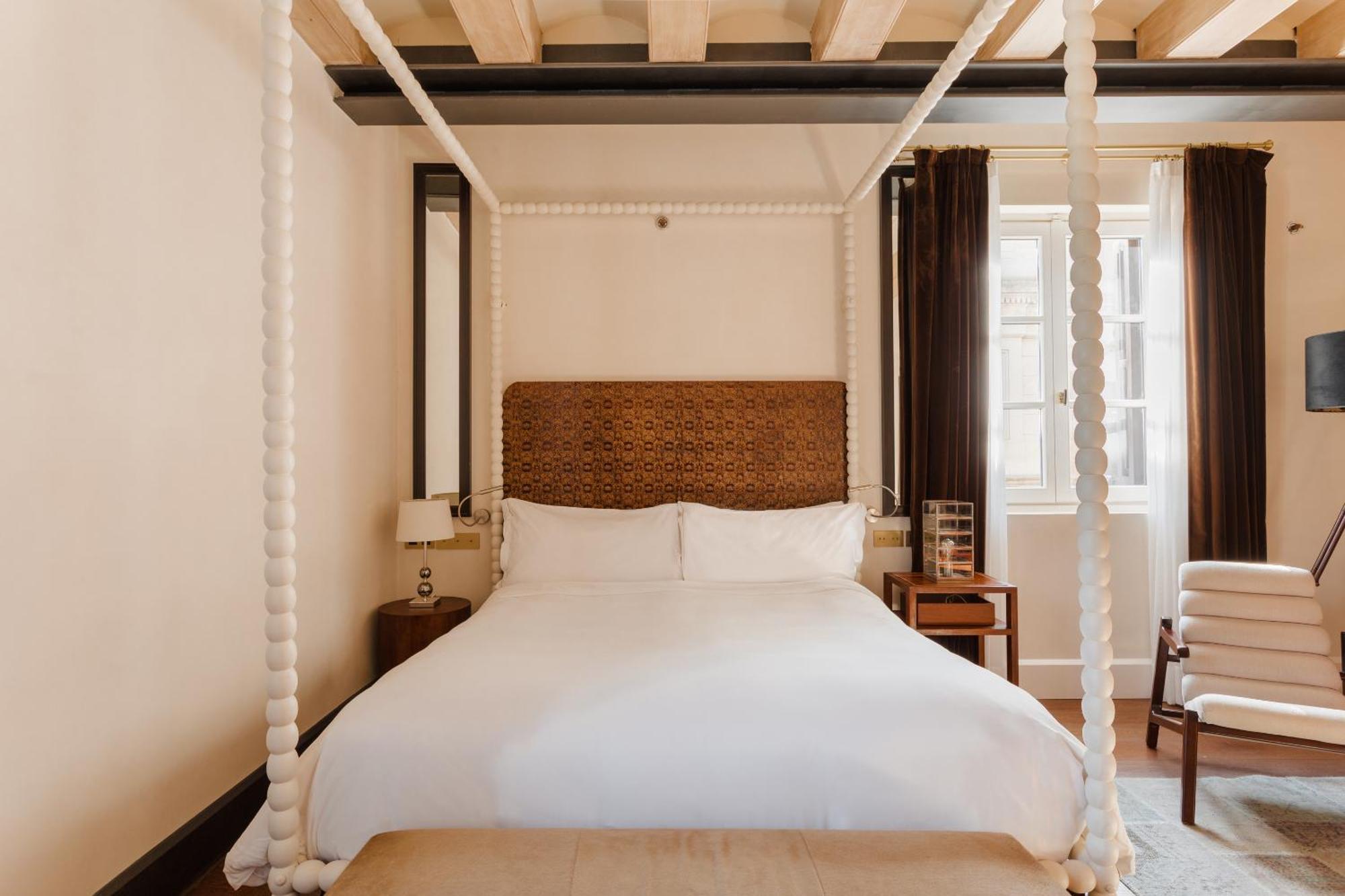 호텔 Do 플라카 레이알 Gl 바르셀로나 객실 사진 A room at the hotel