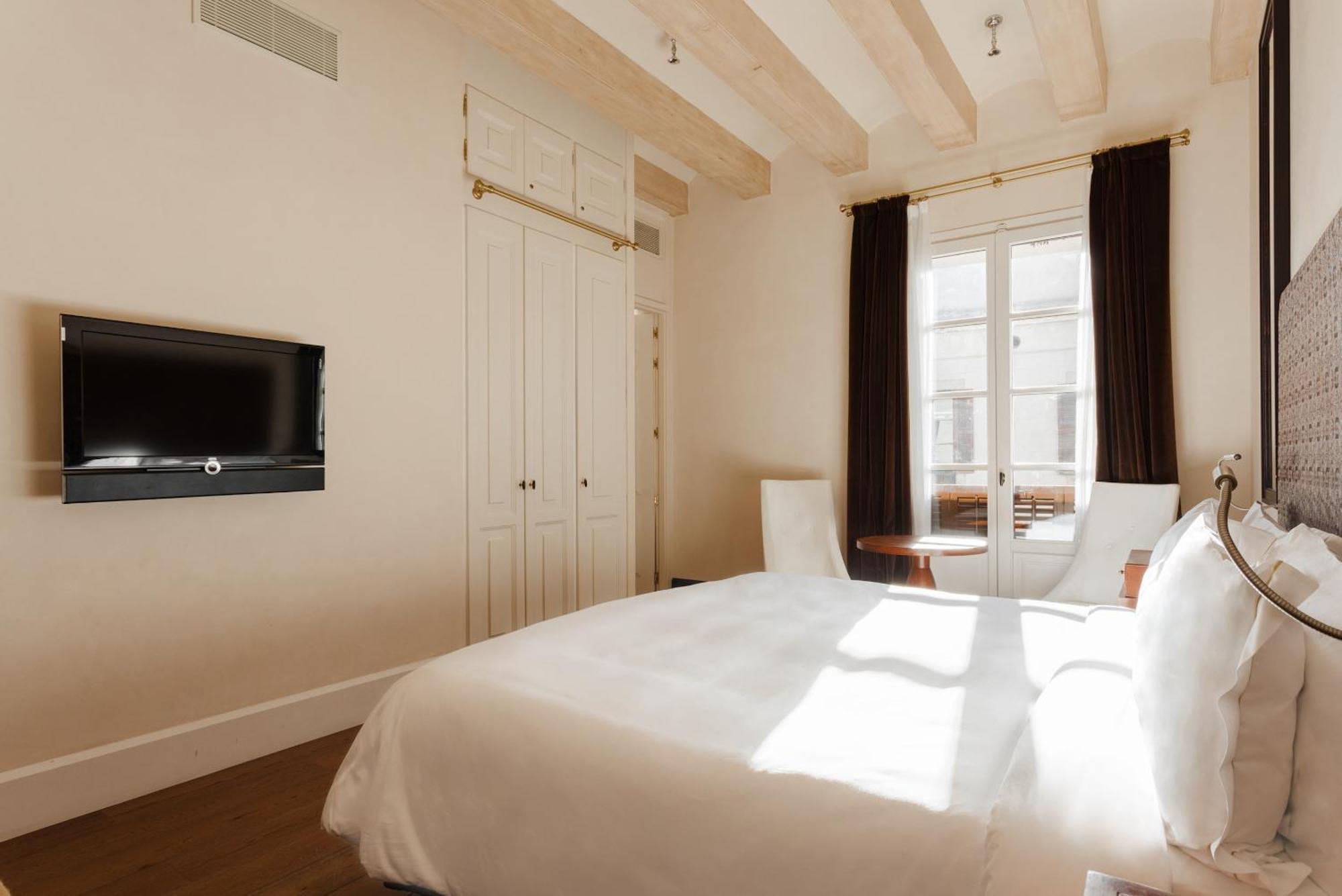 호텔 Do 플라카 레이알 Gl 바르셀로나 객실 사진 A bedroom at the hotel